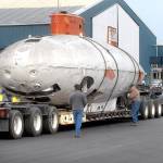 The submersible Deep Quest is prepared for unloading at Platypus Marine Inc. in Port Angeles after its arrival from the U.S. Naval Undersea Museum in Keyport on Tuesday. The Deep Quest, which had been on display at the museum, was built and operated by the Lockheed Missiles and Space Co. in the mid-1960s as a prototype deep-submergence rescue vehicle and was operational until 1980. (Keith Thorpe/Peninsula Daily News)