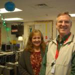 Melissa Withrow and Mark Knudson stand in what used to be the computer lab at Greywolf Elementary School that now serves as one of two new classrooms after more class sections were added at the first- and third-grade levels. (Erin Hawkins/Olympic Peninsula News Group)