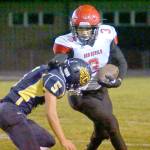 Neah Bays Isaiah Knaus runs against Naselle in the Red Devils Quad-District playoff loss. (By Robert Hilson/for Peninsula Daily News)