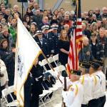 A color guard from American Legion Post 29 of Port Angeles presents the flags of the U.S. Coast Guard and of the United States at Saturdays Veterans Day Ceremony at the U.S. Coast Guard Air Station/Sector Field Office Port Angeles on Ediz Hook. (Keith Thorpe/Peninsula Daily News)