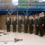 The Olympic Peninsula Mens Chorus, directed by Jim Davis, sings Youre a Grand Old Flag during Saturdays Veterans Day ceremony. (Keith Thorpe/Peninsula Daily News)
