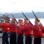 Members of the Mount Olympus Detachment 897 of the Marine Corps League deliver a three-volley rifle salute in honor of fallen veterans. (Keith Thorpe/Peninsula Daily News)