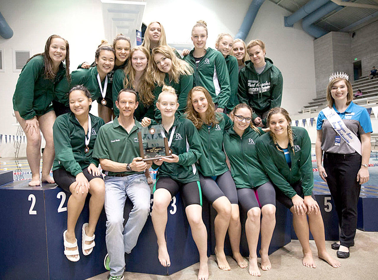 The Port Angeles girls swim team came in third at the State 2A Swim and Dive Championships in Federal Way this weekend. It was the Roughriders second straight year with a top 3 finish. The Riders swim team are, from left, rear Kiara Schmitt, Lum fu, Maggie Martin, Taylor Beebe, Ashlee Seelye, Jane Rudzinski, Nadia Cole, Adriana McClain, Tana Hiigel and Lily Robertson. From left, front row, are Felicia Che, Coach Rich Butler, Emma Murray, Erin Edwards, Sierra Hunter and Kenzie Johnson. Not Pictured are Cassii Middestead and coach Pete Van Rossen. (Patty Reifenstahl)