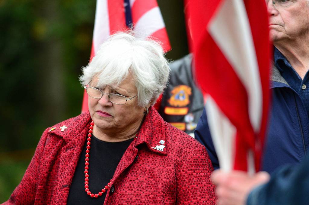 Joan Shields-Bennett watches during a memorial service for her late husband, Marvin G. Shields. (Jesse Major/Peninsula Daily News)​