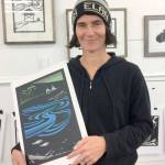 Hannah Viano holds A New Generation, which graces this years Honorary Tree Cards. Bids are being accepted now for the framed original.