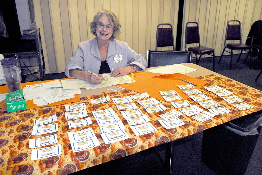 <strong>Jeannie McMacken</strong>/for Peninsula Daily News                                Gail Gautestad waits to check in the second round of volunteers at the Tri-County Thanksgiving meal. Shes been a volunteer for several years and enjoys being involved to help others.