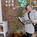 Gail Summers of Seattle spent the holiday glamping at Fort Worden in Port Townsend and stopped by Conservatory Coastal Home to browse and warm up. I definitely support small business whenever I can, she says. I love the originality and artistic ideas that make these stores unique. She planned to buy gifts for family, friends and herself. (Jeannie McMacken/for Peninsula Daily News)