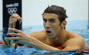 Michael Phelps reacts after winning silver in the men's 200-meter butterfly swimming final at the Aquatics Centre in the Olympic Park in London. The Associated Press