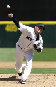 Felix Hernandez throws to a Tampa Bay Rays batter in the third inning of today's game. He faced the minimum 27 batters and struck out 12 of them. The Associated Press