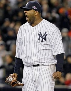 New York Yankees starting pitcher CC Sabathia reacts after Baltimore Orioles' J.J. Hardy grounded out to end the eighth inning of Game 5 of the American League division baseball series. The Associated Press