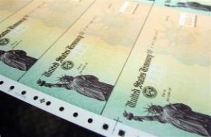 Rolls of blank social security checks ran through printers and were processed at the U.S. Treasury's Financial Management services facility in Philadelphia. Associated Press file photo