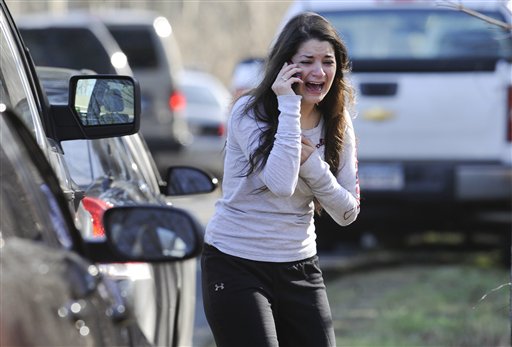 A woman waits to hear about her sister