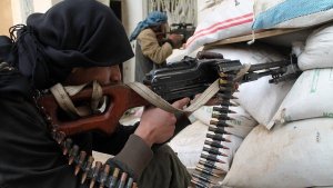 Opposition fighters in combat in Syria. The Associated Press