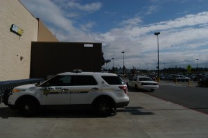 Clallam County deputies searched the Walmart Supercenter outside Port Angeles and checked surveillance video before concluding that a report of a man loading a handgun int he store was erroneous.