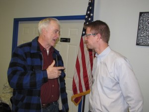 Richard Coulson of Port Angeles talks to Congressman Derek Kilmer about the use of all-terrain vehicles in national forests during a Wednesday visit to Forks
