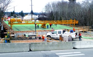 Workers prepare to pour concrete for the deck of the new Lauridsen Boulevard bridge over Peabody Creek in Port Angeles on Thursday. Keith Thorpe/Peninsula Daily News