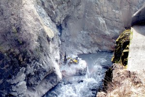Very little of the formerly 210-foot Glines Canyon Dam remains in this Saturday webcam photo as crews set explosives