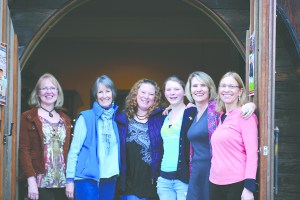Poised to welcome people to the International Women's Day supper at Olympic Cellars winery Wednesday are