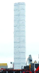 The plastic wrappings may be taken off the Peninsula Plywood stack in Port Angeles starting today in advance of its demolition set for next month. Keith Thorpe/Peninsula Daily News