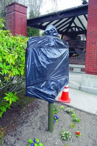A Blue Star Memorial Plaque sits covered in plastic Thursday in Veterans Memorial Park in Port Angeles. Keith Thorpe/Peninsula Daily News