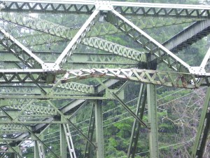An overhead beam on the Sol Duc River bridge in Forks shows damage from being clipped recently