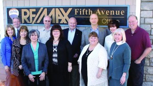 RE/MAX Fifth Avenue real estate agency staffers — in front from left