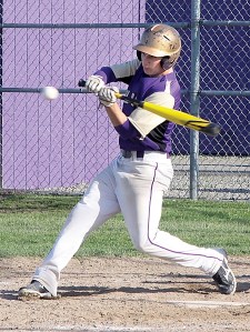 Sequim's Brett Wright swings at a pitch during the Wolves' 8-4 victory over Bremerton. Wright finished with three hits