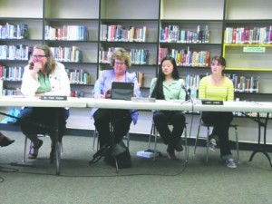 Port Angeles School Board members Patti Happe