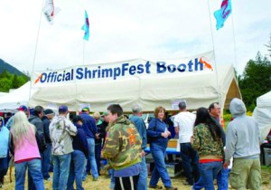Crowds gather to buy the coveted Hood Canal spot shrimp at the 2013 Brinnon ShrimpFest. Phil Thenstedt