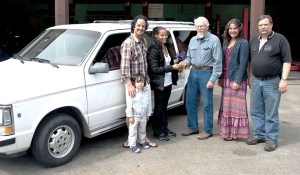 Pictured with the donated van are