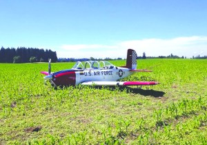 A 1950s-era Beechcraft sits in a cornfield near Camas after making an emergency landing. Clark County Sheriff's Office