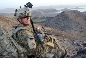 Army Staff Sgt. Ty Carter watches over a road in Afghanistan in July 2012. U.S. Army via The Associated Press