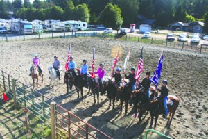 The County Mounties and Silver Spurs 4-H drill teams performed at the Jefferson County Fair last weekend. From left are Kalyssa Strayer