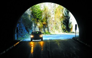 A car makes its way through the third of three tunnels on the way up Hurricane Ridge Road in Olympic National Park. Keith Thorpe/Peninsula Daily News