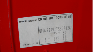 The tag that shows the VIN on a 1996 Porsche. Wikipedia