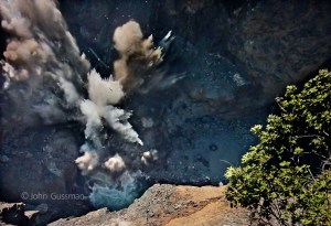 Elwha River dam removal videographer/photographer John Gussman captures the moment at 4:12 p.m. Tuesday that the final piece of Glines Canyon Dam was made into rubble. Copyright &Copy; 2014