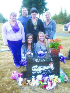 Surrounding Jennifer Pimentel's grave at Ocean View Cemetery in Port Angeles are