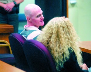 Patrick Drum looks over at attorney Karen Unger on Thursday in Clallam County Superior Court in Port Angeles. Keith Thorpe/Peninsula Daily News