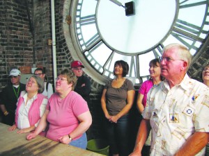 A group tours the tower at Clallam County Courthouse on Sunday in Port Angeles. Arwyn Rice/Peninsula Daily News