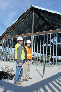 Lydig Construction project manager Ed Griffin and Sequim City Manager Steve Burkett discuss the construction progress on Sequims new civic center during a tour of the complex. Photo by Mark St.J. Couhig/Peninsula Daily News