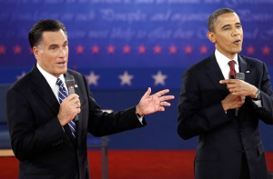 President Obama and Mitt Romney spar during Tuesday night's presidential debate. The Associated Press