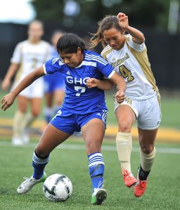 Peninsula College's Solana Ashe (4) competes for the ball with Grays Harbor's Ashley Alonzo during the Pirates' 8-0 win over the Chokers. Jeff Halstead/for Peninsula Daily News