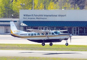 A Kenmore Air Express commuter plane lands at William R. Fairchild International Airport in Port Angeles. Keith Thorpe/Peninsula Daily News