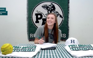 Port Angeles High School softball standout Carly Gouge signs a letter of intent to play at Hillsdale College in Hillsdale