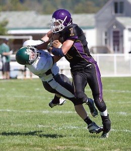 Quilcene running back Colten Pol (1) levels a Mary M. Knight defender during the Rangers' 52-14 win. Steve Mullensky/for Peninsula Daily News