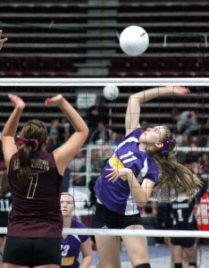 Quilcene's Megan Weller attempts a spike against Sunnyside Christian's Mackenzie Benjert during last year's Class 1B state volleyball tournament in Yakima. Roger Harnack/The Omak-Okanogan County Chronicle