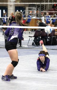 Quilcene's Alex Johnsen dives for the ball as Allison Jones positions herself at the net during the Rangers' win over Odessa-Harrington at the state tournament. Roger Harnack/The Omak-Okanogan County Chronicle