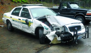 A damaged Clallam County Sheriffs Office patrol car sits at the Clallam County Shop Yard in Port Angeles on Wednesday after it was involved in a wreck.  Keith Thorpe/Peninsula Daily News