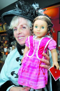 Barbara Lott of Port Angeles displays the grand-prize doll that will be awarded by drawing at this weekend's “Promise of Spring” doll show at Vern Burton Community Center in Port Angeles. Keith Thorpe/Peninsula Daily News