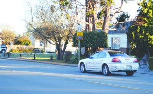 New traffic monitoring signs have been posted on Sequims Spruce Street to gauge the speed of passing traffic after neighbors complained of excessive speeding.  Photo by Joe Smillie/Peninsula Daily News